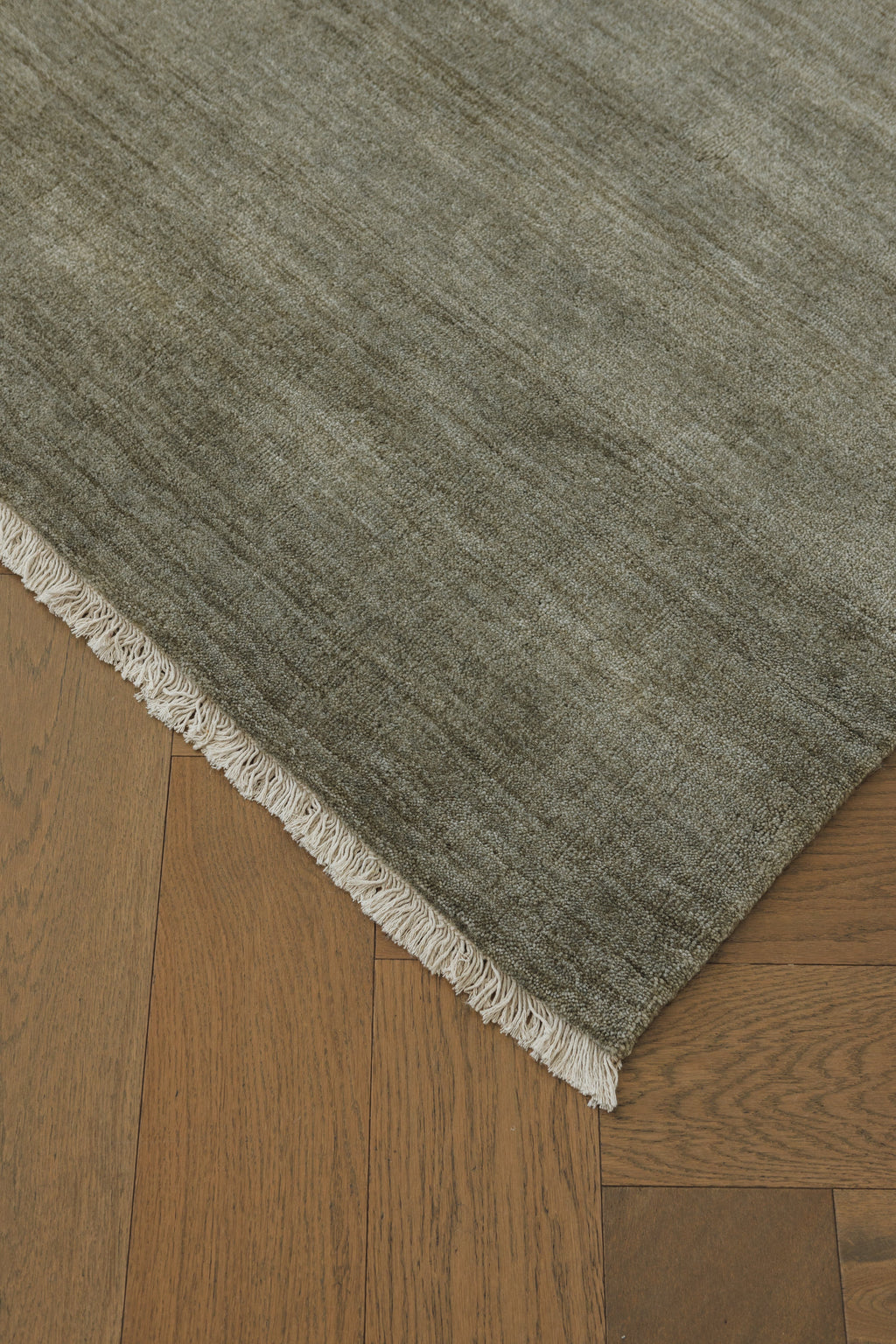 Sample of Bhakti Abrash Wool Blend Rug in Olive