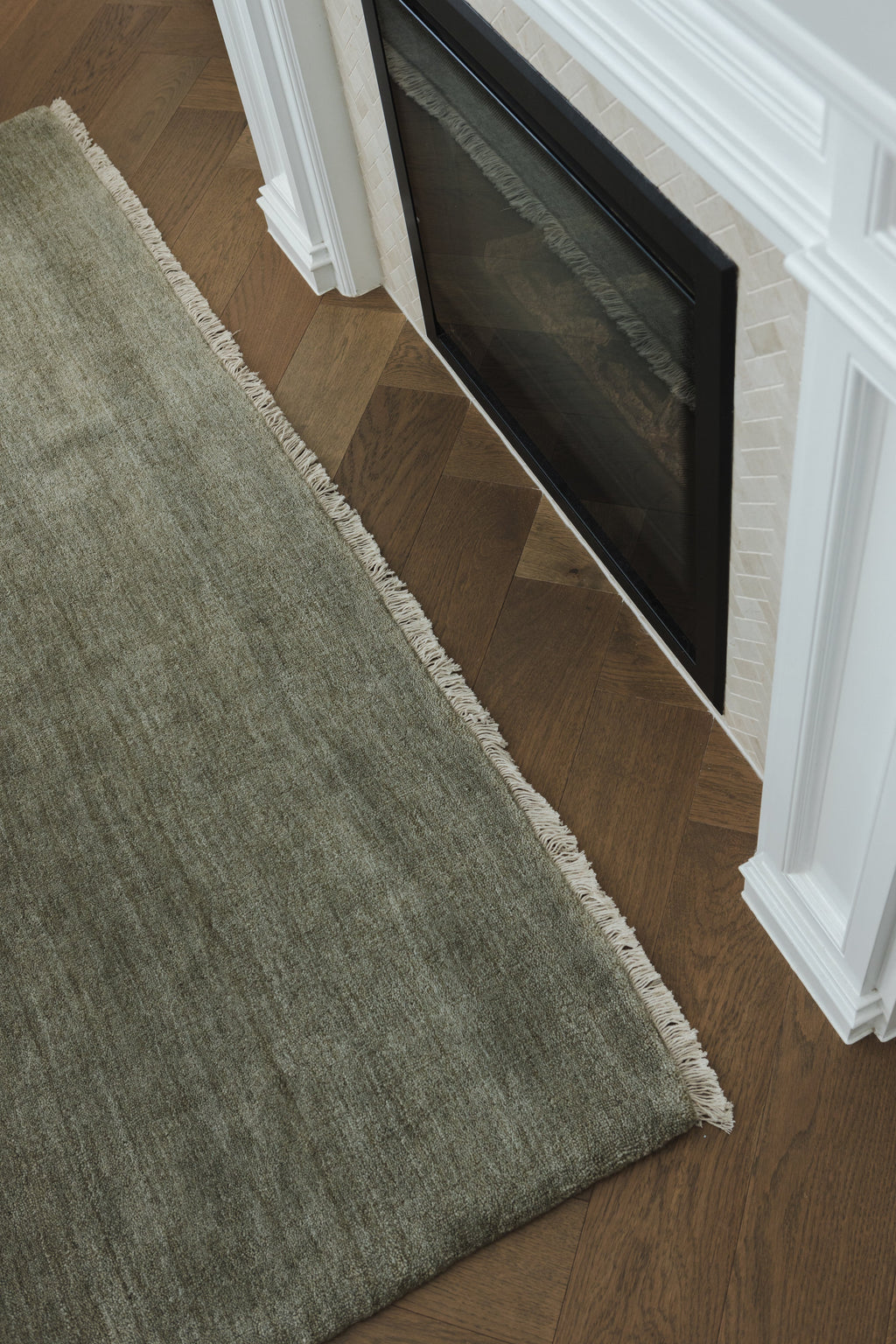 Sample of Bhakti Abrash Wool Blend Rug in Olive