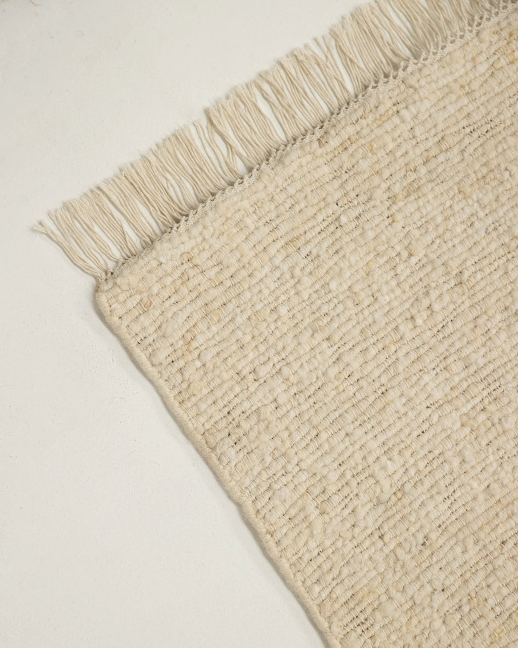 Kiva Hand Woven Wool Rug in Ivory
