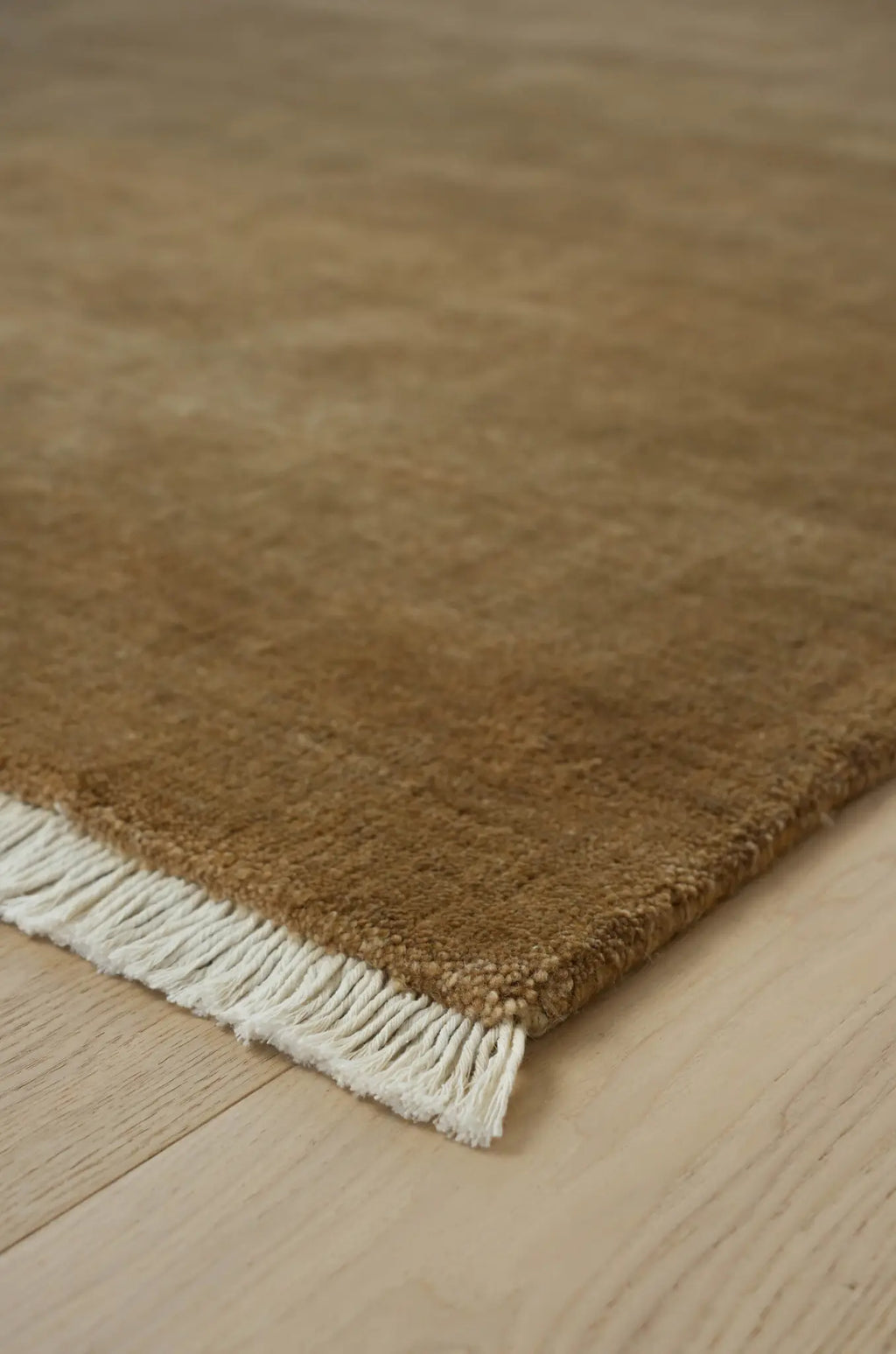 Bhakti Abrash Wool Blend Rug in Brown Butter