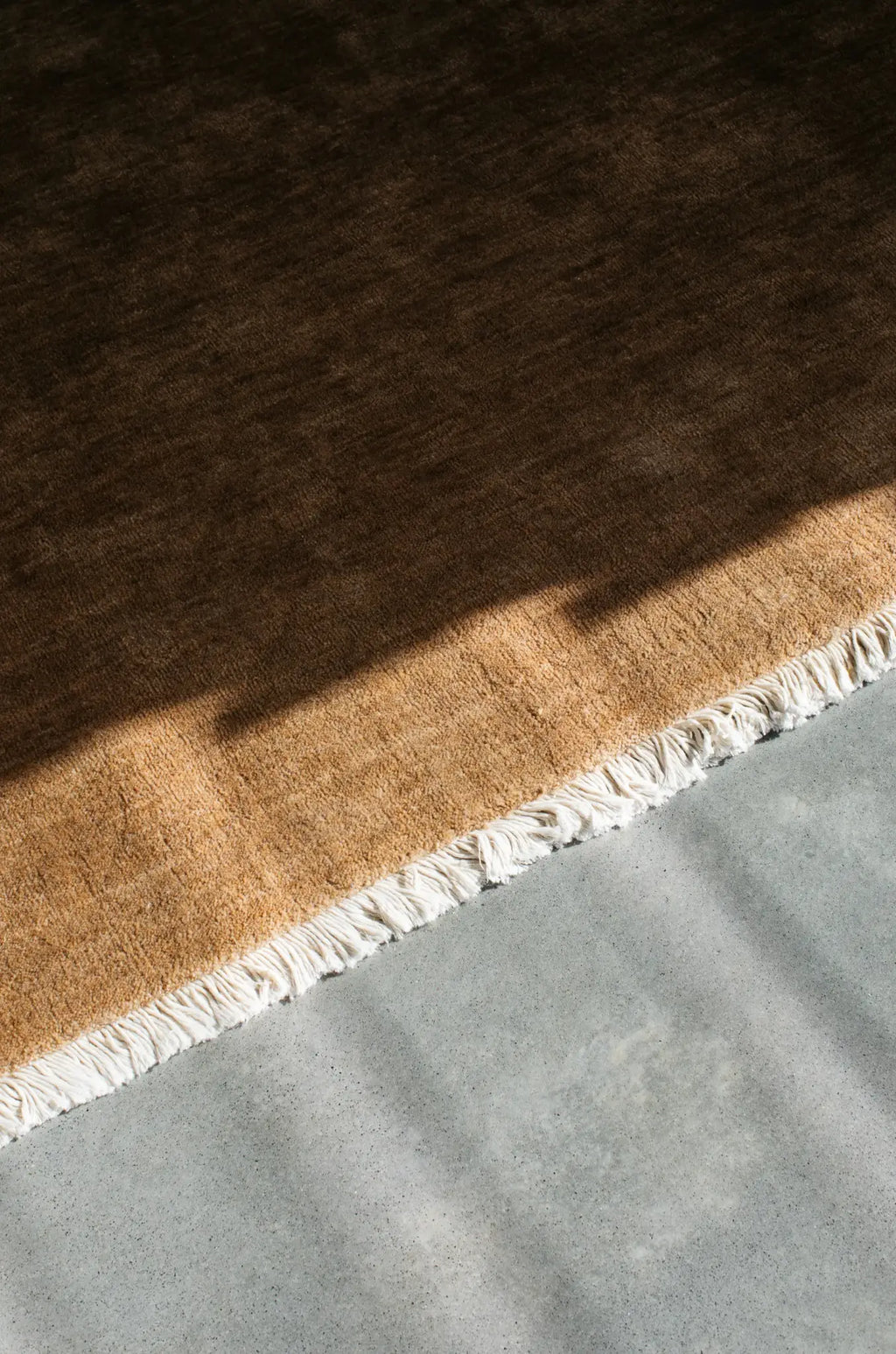 Bhakti Abrash Wool Blend Rug in Brown Butter