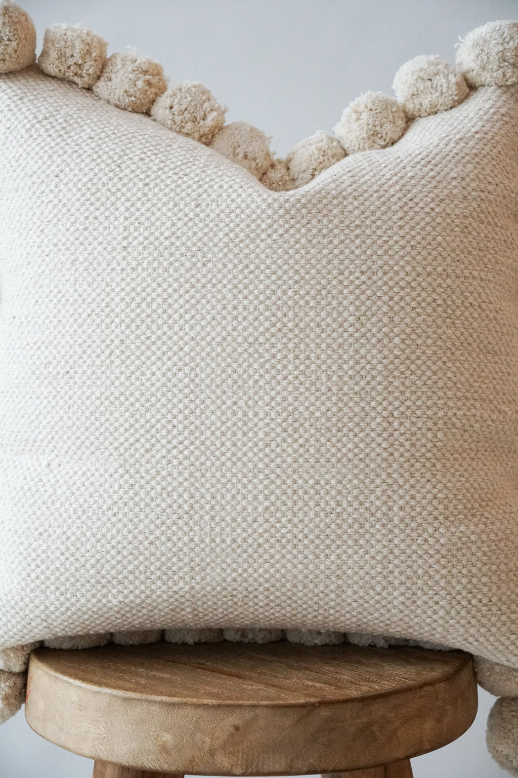 Luma Pom Pom Cushion in White