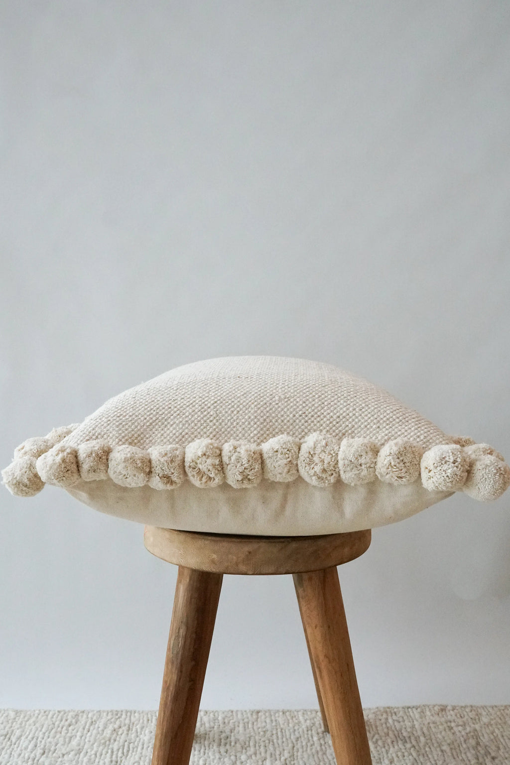 Luma Pom Pom Cushion in White