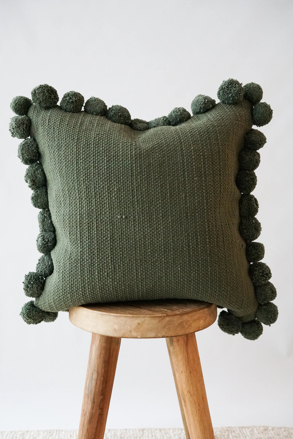 Luma Pom Pom Cushion in Olive