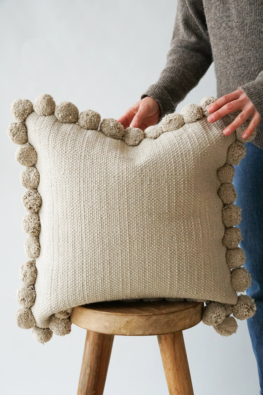 Luma Pom Pom Cushion in Grey
