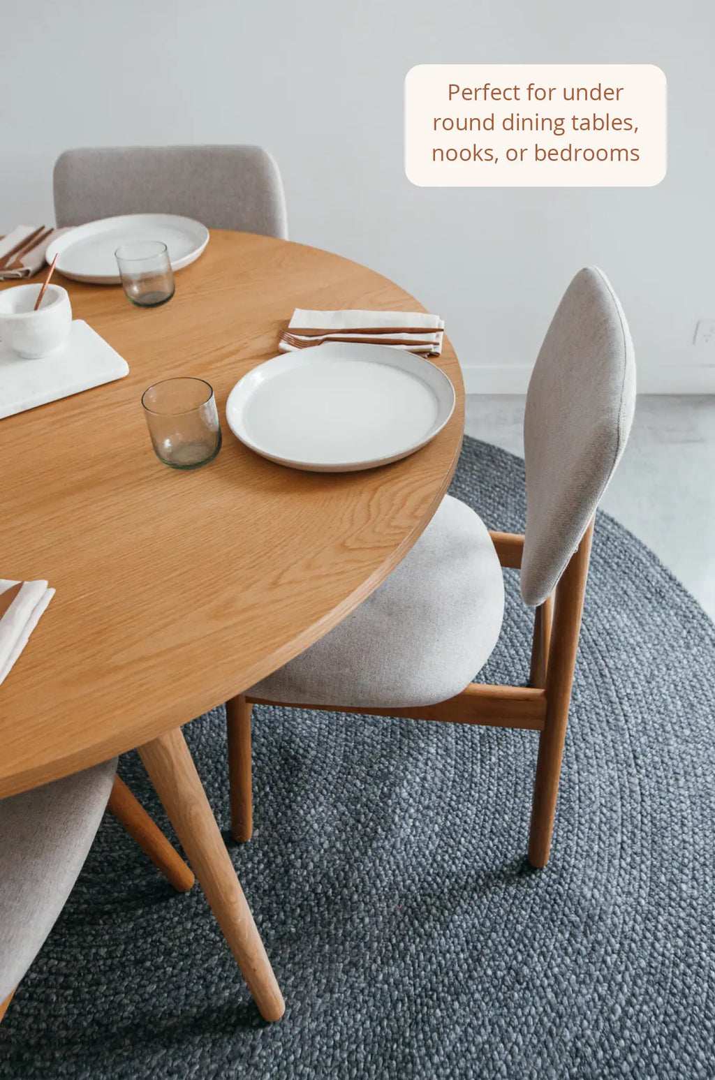 Jiva Round Braided Wool Rug in Charcoal